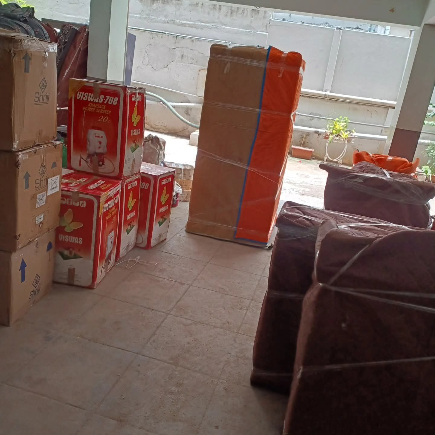 Transport vehicle loaded with household goods